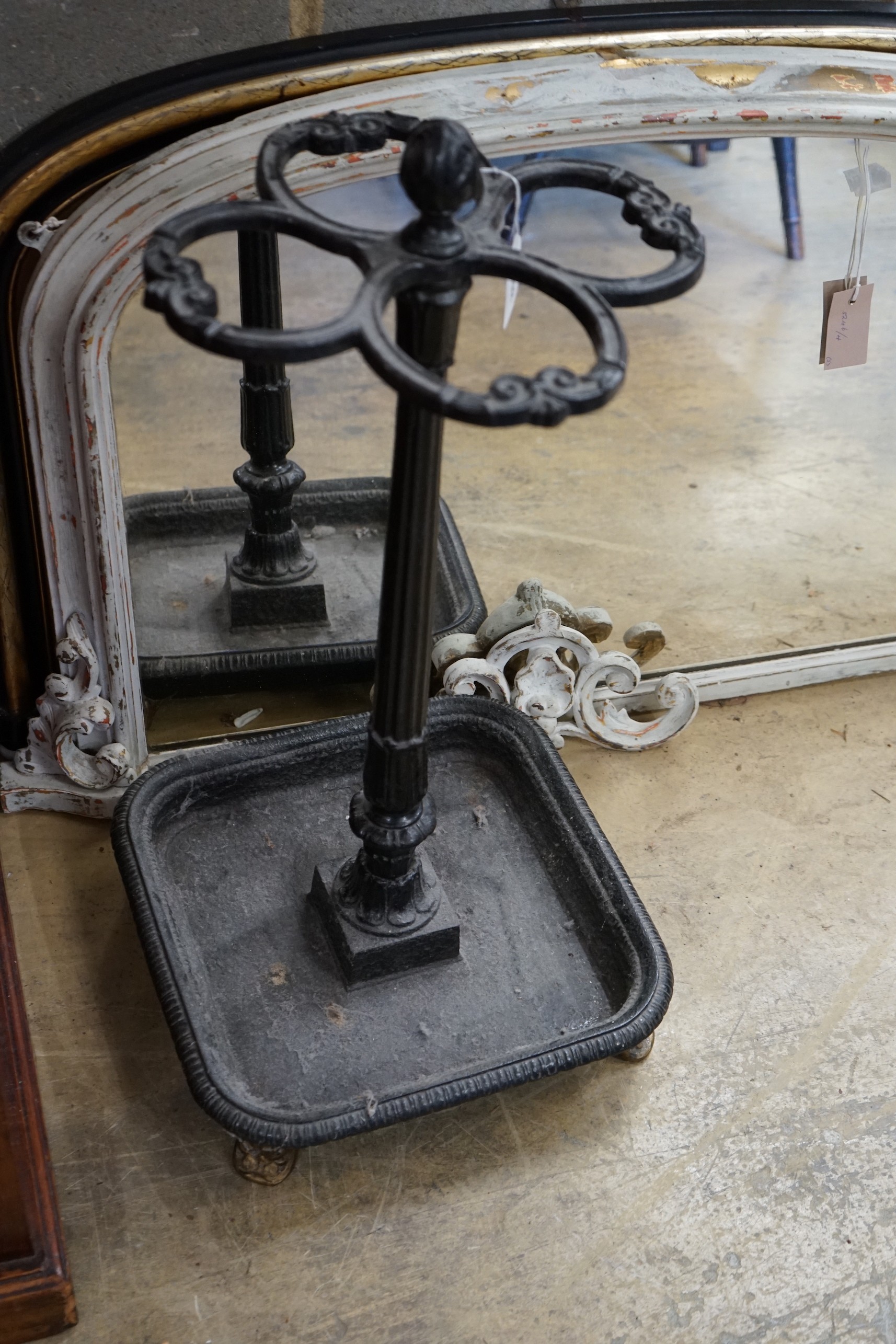 A Victorian style cast iron four division stick stand, height 66cm